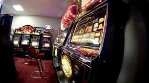 62ph casino lobby showing slot machines and live dealer game tables